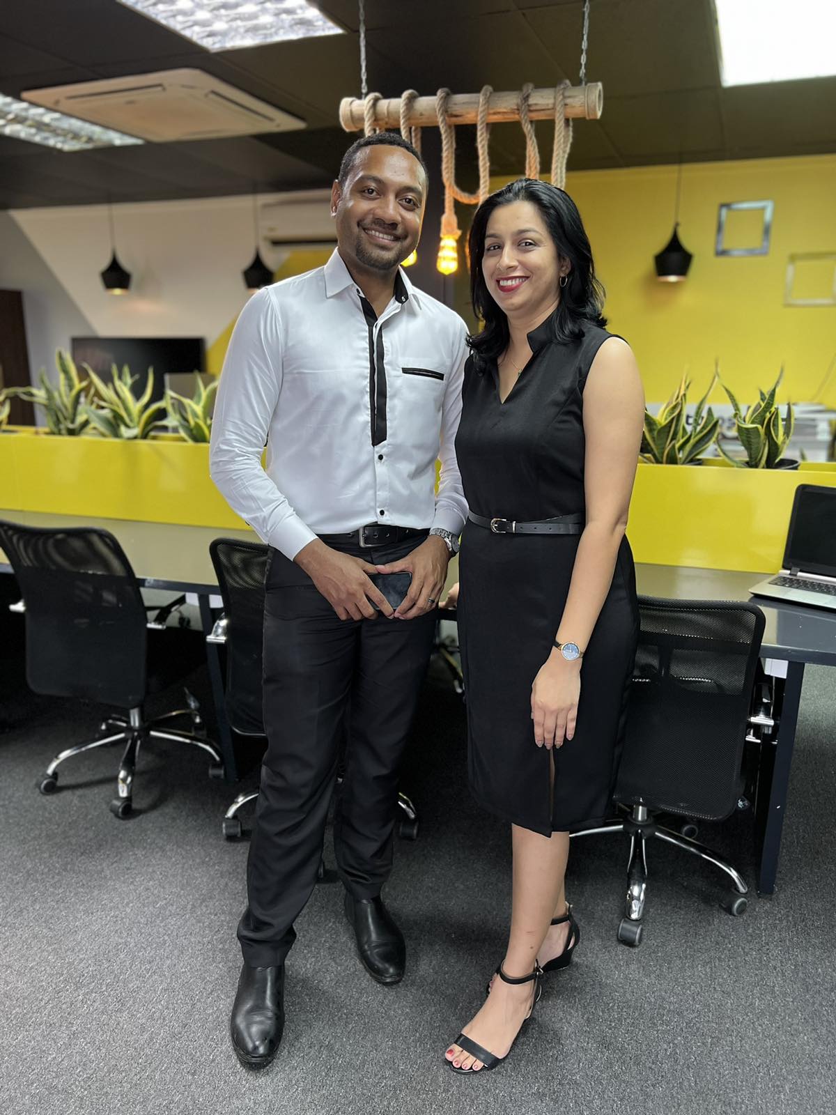 Executives in tailored black formal wear by Eleganza